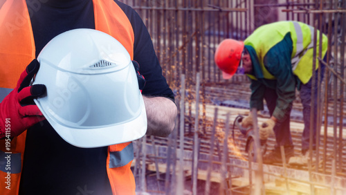Construction worker holding...