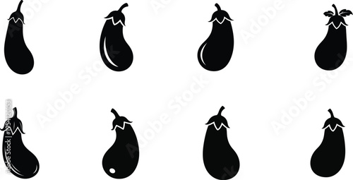 Fotografie Eight black pear shaped objects in two rows on white background