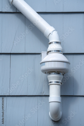 radon mitigation installed system outside the house
