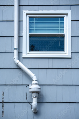 radon mitigation installed system outside the house