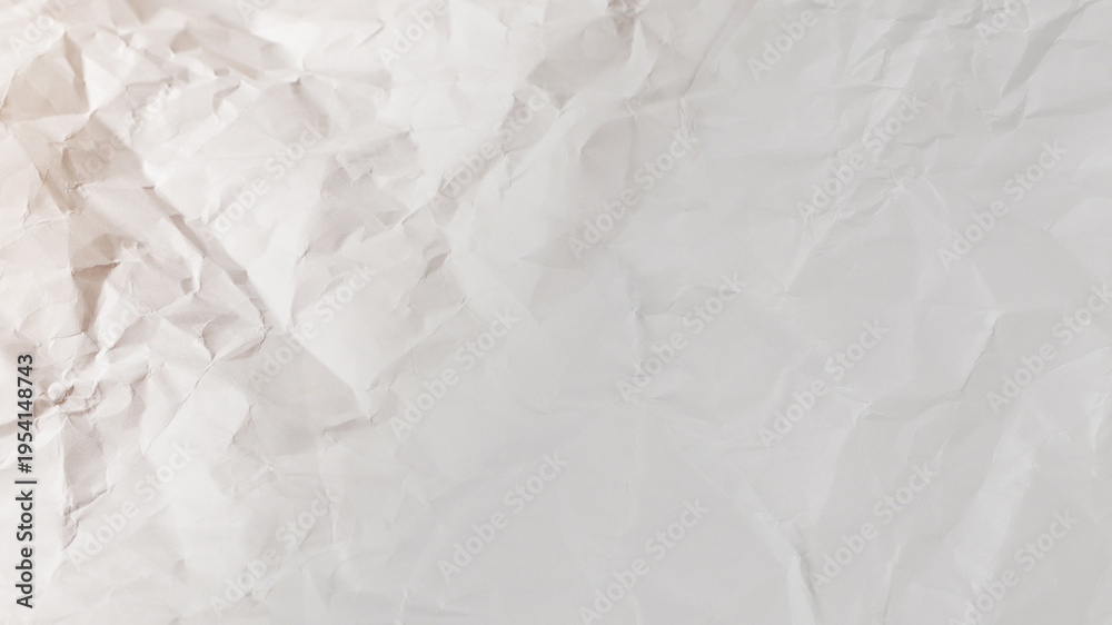 Naklejka premium Crumpled white paper background.