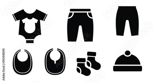 Baby clothing and accessories arranged on a white background