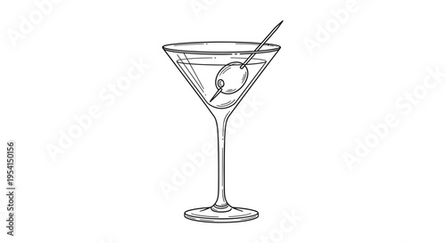 A cocktail martini glass contains a clear drink with a lemon twist and stirrer on a table indoors.