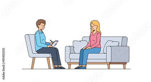 A male therapist writes on a notepad while a female client sits on a sofa during a session.