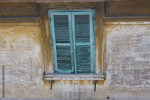 old window with shutters