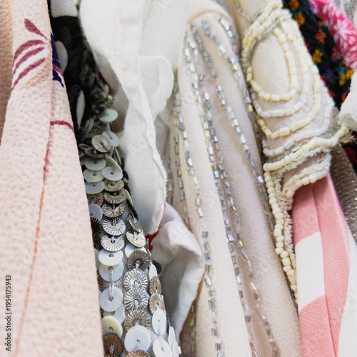 Photos Glamour up close: mixed festive clothing with sequins, beading and printed cotto