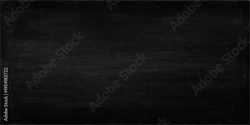 A dark, grunge chalkboard surface with an old, textured black pattern and a vintage gray wooden frame creates a blank, aged backdrop for a dirty blackboard with chalk