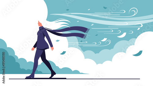 Woman walking forward against a very strong wind with her long hair and scarf blowing backwards amidst white clouds in a blue sky.