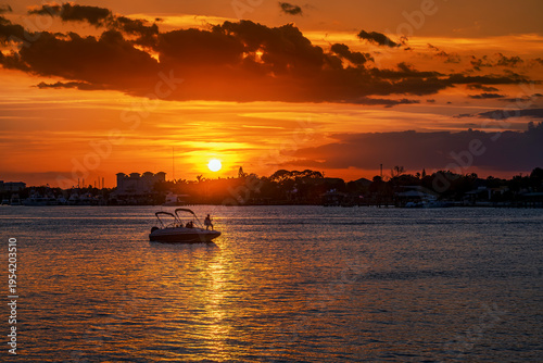 Fishing from a boat at sunset in the Indian river lagoon New Smyrna Beach Florida, USA