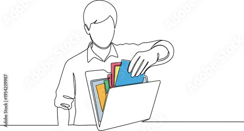 A man is putting files into a folder on a desk