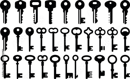 Set of black metal keys isolated on white background for security access unlocking solutions and locksmith concepts