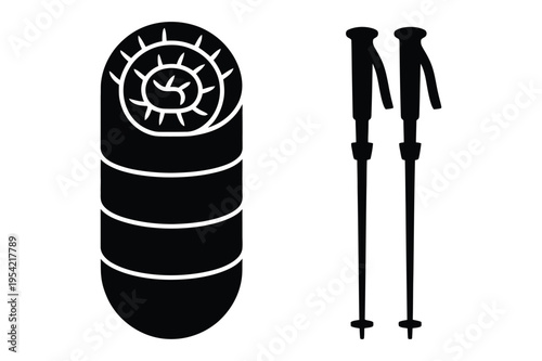Sleeping bag and hiking poles with black and white