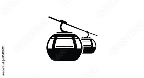 Two cable cars travel along a wire a striking black silhouette