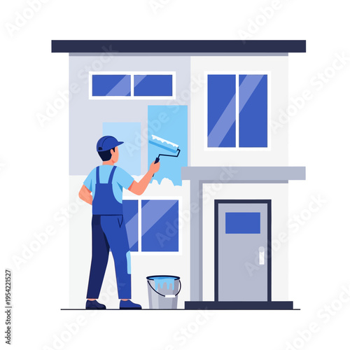 Painter in blue overalls painting house exterior with roller, bucket of paint