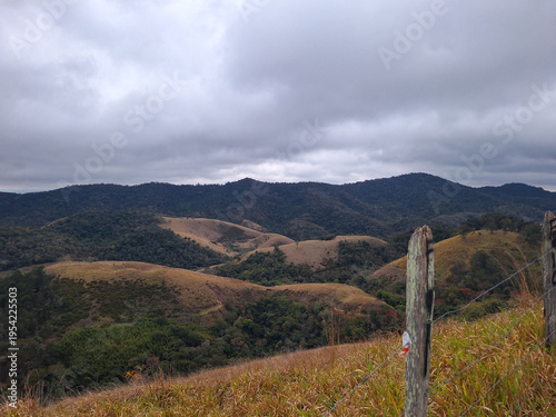 autumn landscape with mountains and clouds