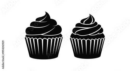 Two black silhouette cupcakes with swirling frosting on paper liners