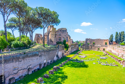 Schilderij op canvas Visitors explore the Palatine Stadium located in the Roman Forum area of Rome