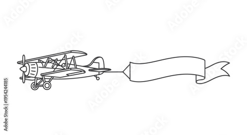 Vintage Biplane with Banner Attached Side.