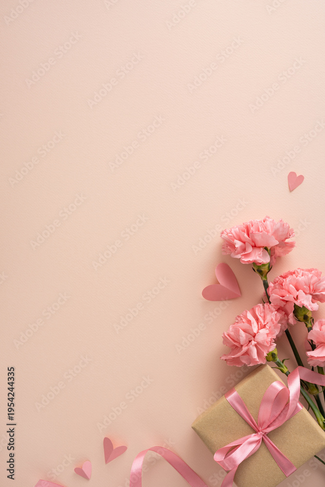 Naklejka premium Happy Mother's Day vertical composition featuring pink carnations and a ribboned gift box with paper heart cutouts on a soft pastel background ideal for greeting cards and social posts