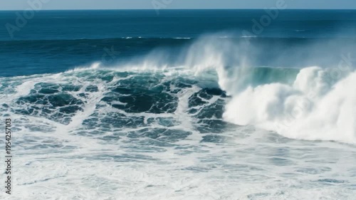 Powerful Ocean Wave Crashing on Shore with Foamy Water and Blue Sea Background for Weather or Travel Use