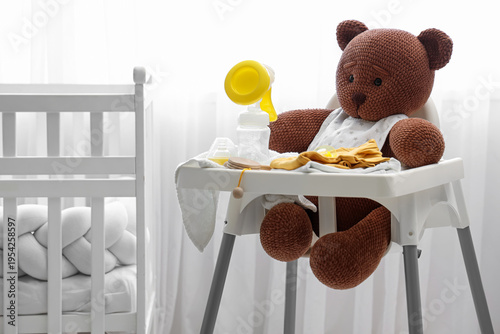 Baby highchair with toy bea...