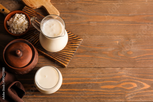 Jug of fresh kefir and bowl...