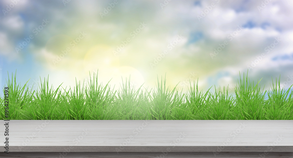 Fototapeta premium Green spring grass and wooden table under beautiful sky. Banner design