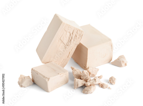 Blocks of fresh yeast on wh...