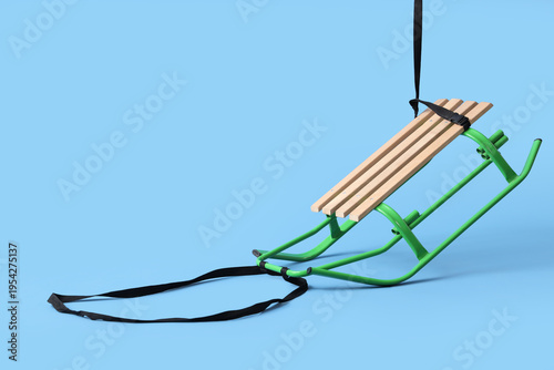 Empty sled on blue background