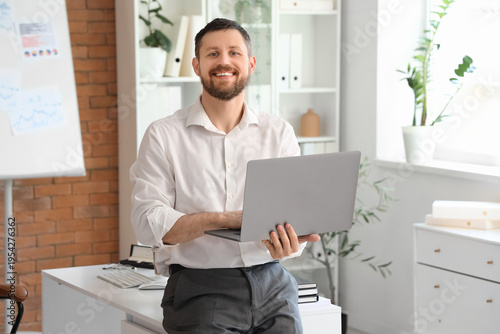 Young businessman working w...