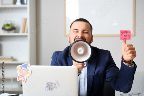 Young businessman with pape...