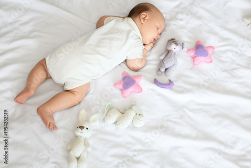 Cute little baby with toys ...