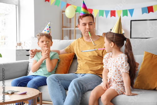 Father and his children wit...
