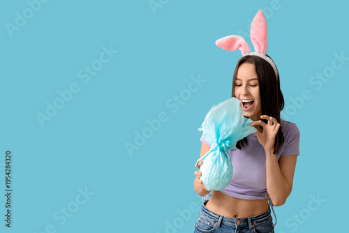 Pretty young woman with bun...