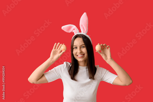 Pretty young woman with bun...