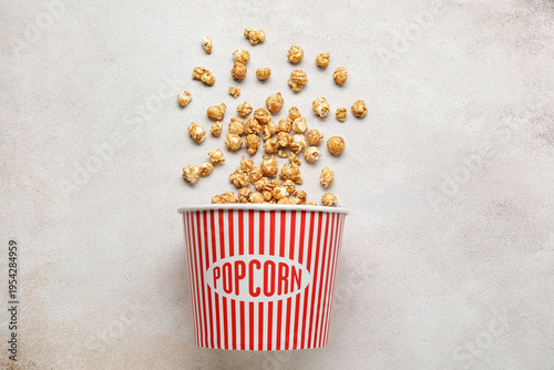 Bucket with tasty popcorn o...