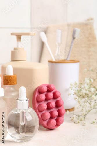 Bottles of essential oil an...