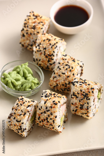 Plate with tasty sushi roll...
