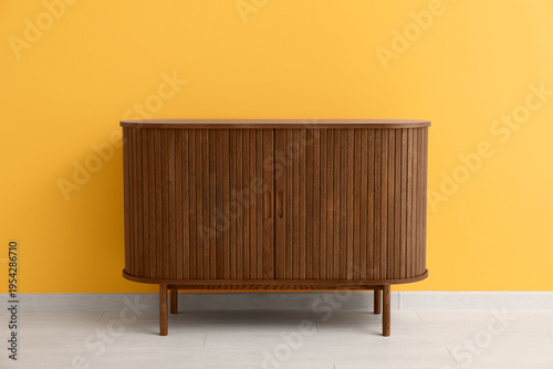 Stylish wooden chest of dra...