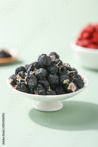 Fresh Black Wolfberries from Qinghai Province in White Bowl - Studio Food Photography
