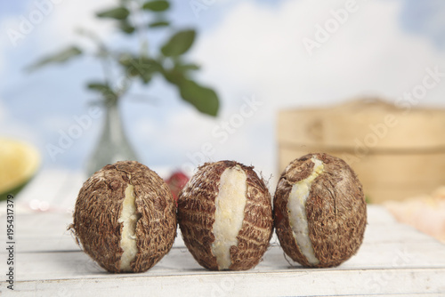 Fresh Coconuts Split Open Showing White Meat in Bright Studio Still Life Photography