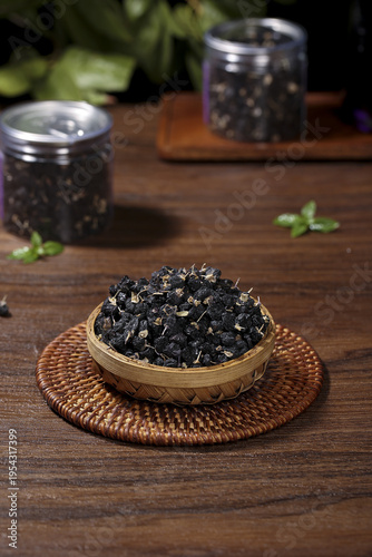 Qinghai Black Wolfberry Goji Berries in Bamboo Bowl Still Life Photography