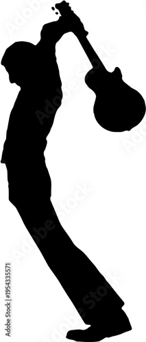 Silhouette of a Rock Guitarist Smashing an Electric Guitar on Stage