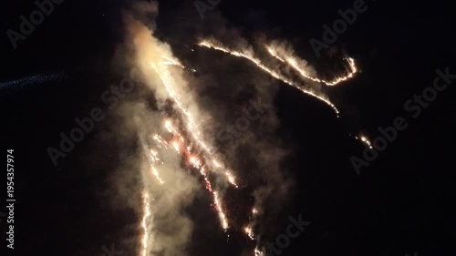 aerial pullout over brushfire at night near boone and blowing rock nc, north carolina