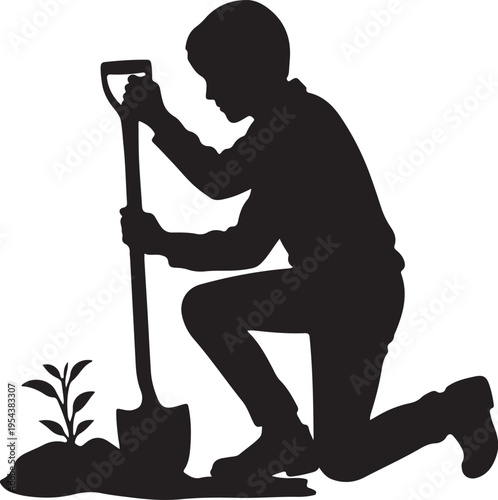 Silhouette of a Boy Planting a Sapling with a Shovel