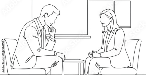 Two people engaged in conversation in lounge chairs illustrating discussion, interview, or therapy session