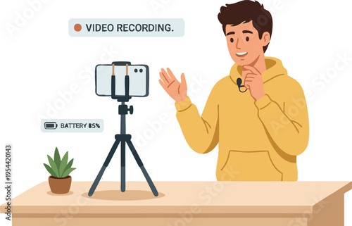 Young man recording video blog using smartphone and tripod