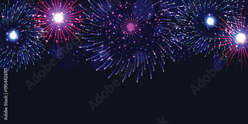 Decorative colorful fireworks explosions isolated on dark blue background