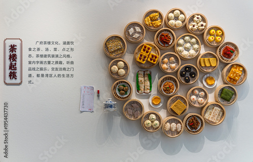 Schilderij op canvas Cantonese Dim Sum Spread with Bamboo Steamers and Menu