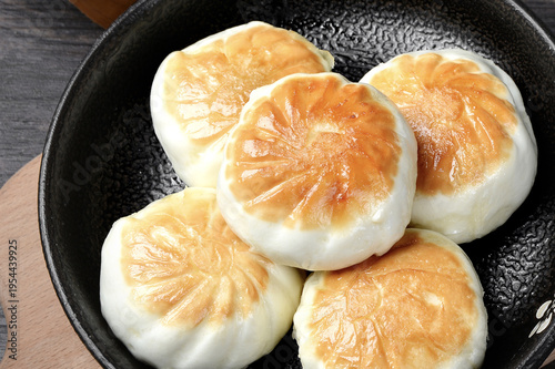 Photography Steamed Shanghai Pan-Fried Buns in Wok